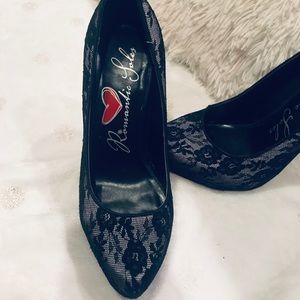 Black lace pumps